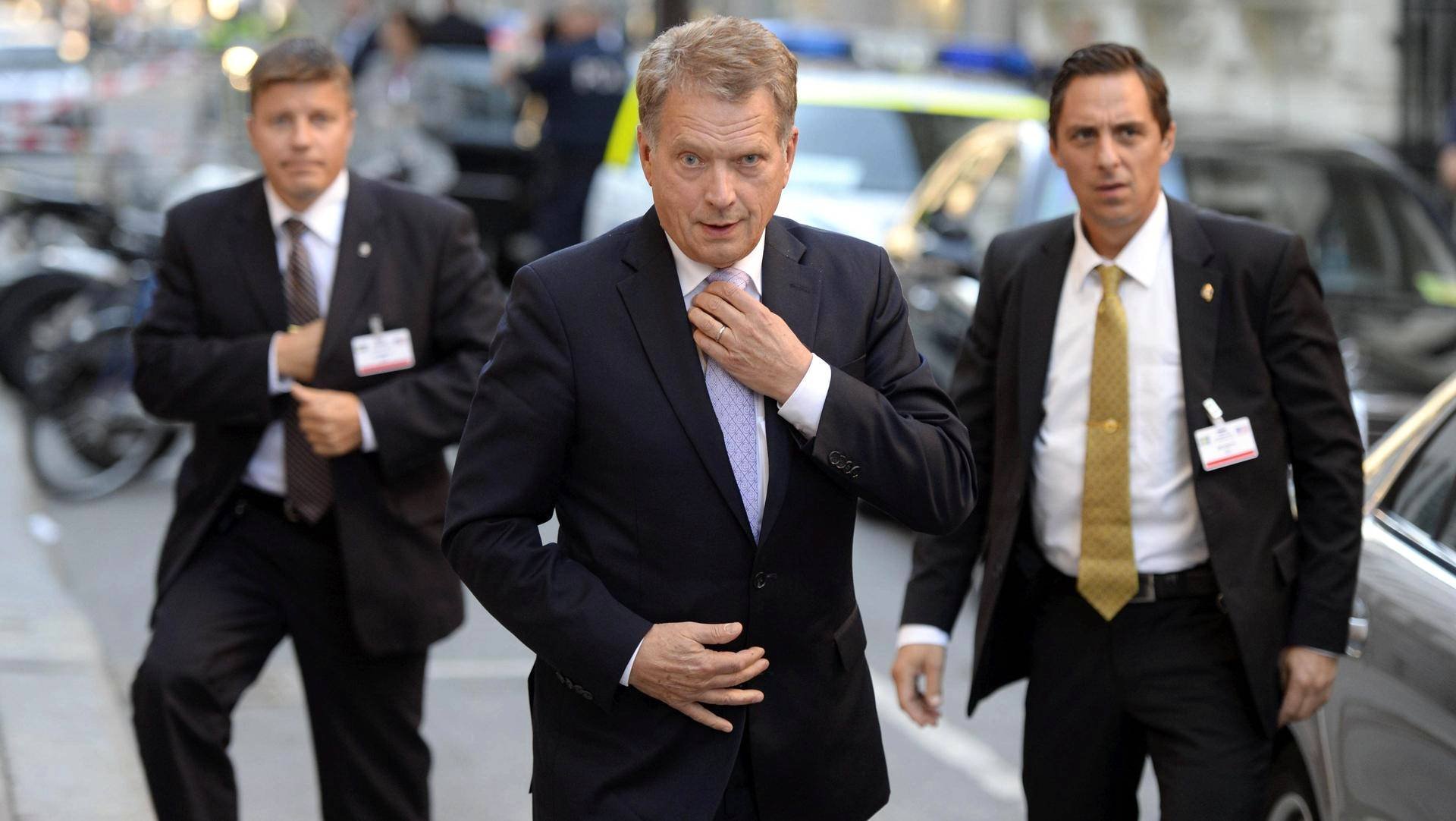 Meme masters: Finnish President's summit look matches both James Bond &  Matrix