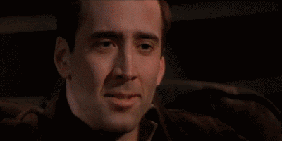 Image result for nicolas cage laughing gif