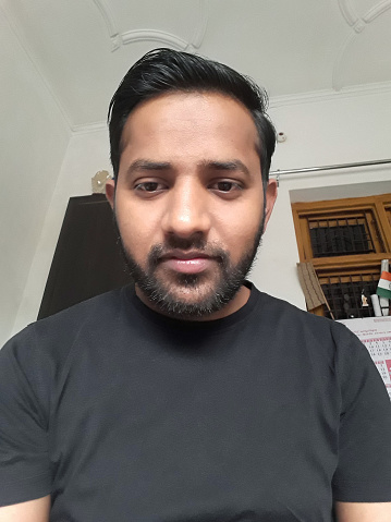 image-of-young-handsome-hindu-man-in-early-20s-taking-selfie-with-picture-id1213122500
